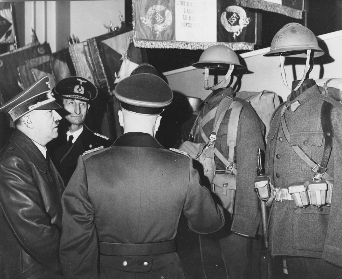 Adolf Hitler inspects Belgian and British uniforms in Berlin's Zeughaus